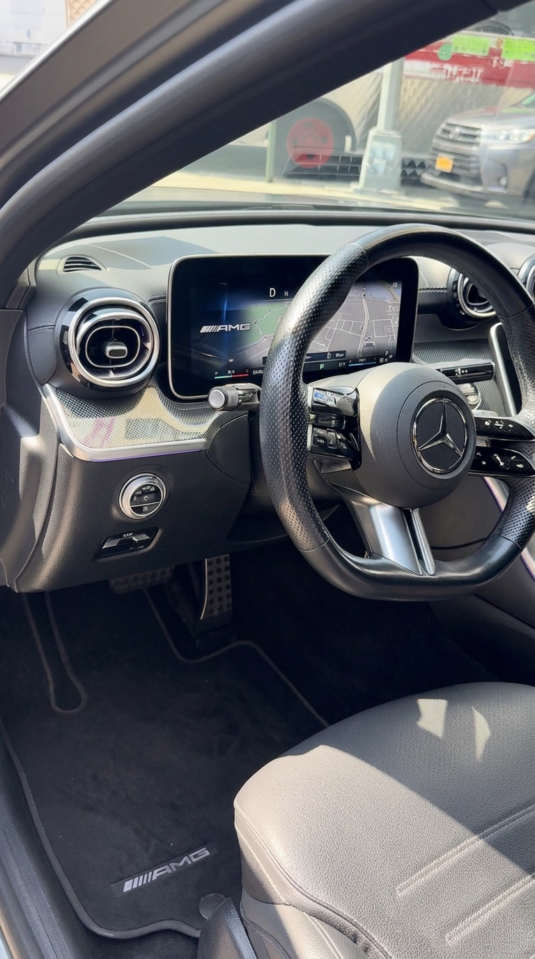 Clean Mercedes interior with detailed dashboard and leather seats